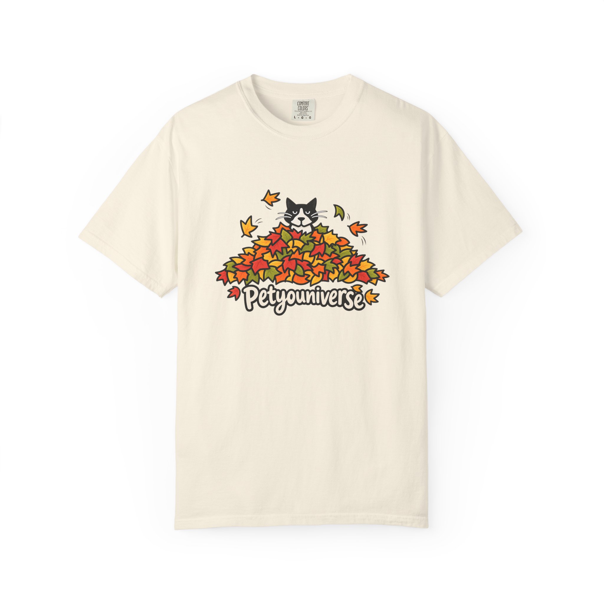 Cute cat peeking from autumn leaf pile graphic on PetYoUniverse t-shirt
